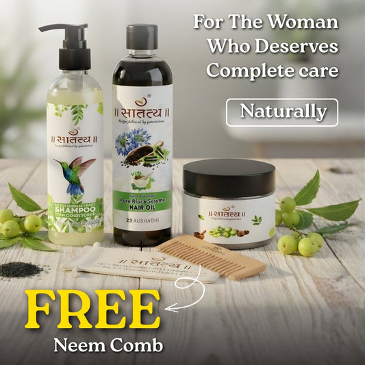 Hair care products with a free neem comb offer on a wooden surface.